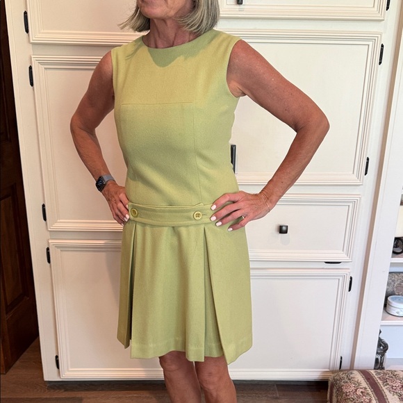 Majestic Sleeveless Green Dress with Pleated Skirt - Picture 2 of 8